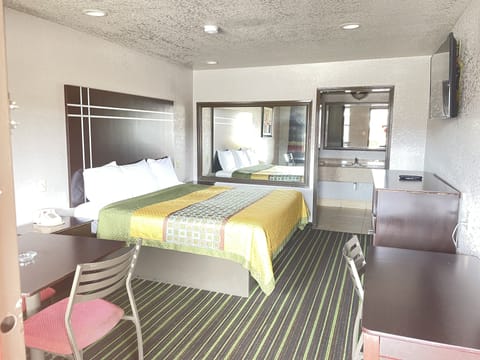 Standard Room, 1 King Bed, Refrigerator & Microwave | Desk, free WiFi, bed sheets