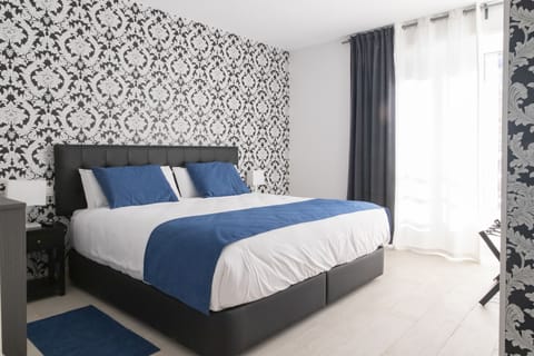 Deluxe Double Room | Premium bedding, memory foam beds, blackout drapes, soundproofing