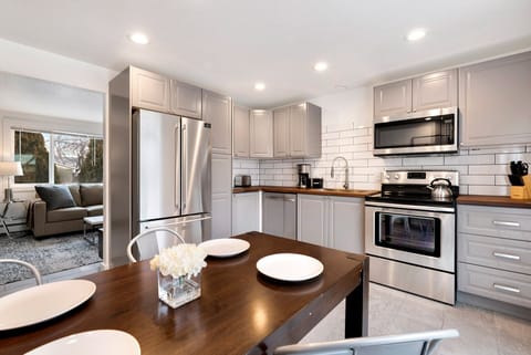 Townhome, Multiple Beds, Patio, Garden View (1751 E 16th St. Loveland) | Private kitchen | Fridge, microwave, oven, stovetop