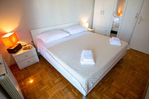 Family Apartment, 2 Bedrooms, Balcony, Courtyard View | 2 bedrooms, blackout drapes, iron/ironing board, free WiFi