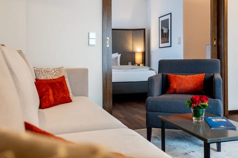 Suite, 1 King Bed | Living area | Flat-screen TV