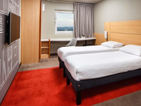 Hypo-allergenic bedding, desk, blackout drapes, iron/ironing board