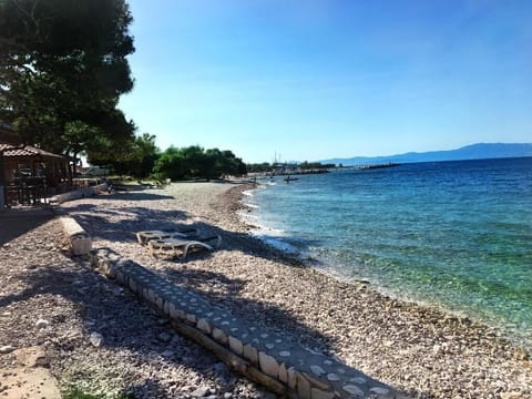 Beach nearby, white sand, sun loungers, beach umbrellas
