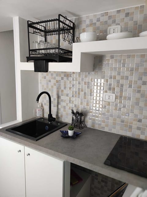 Family Condo | Private kitchen | Mini-fridge, stovetop, cookware/dishes/utensils