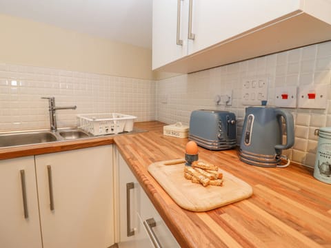 Fridge, electric kettle, toaster, cookware/dishes/utensils