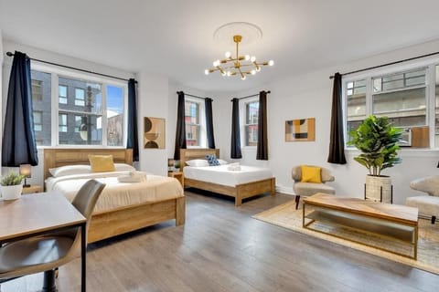 Family Room | Down comforters, desk, laptop workspace, free WiFi