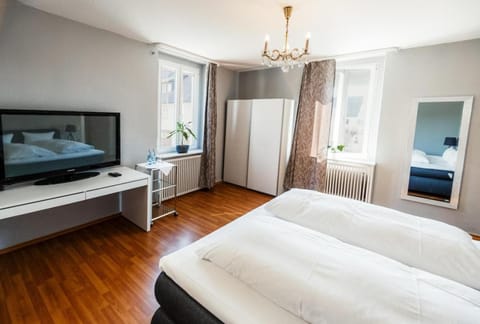 Desk, laptop workspace, free WiFi, bed sheets