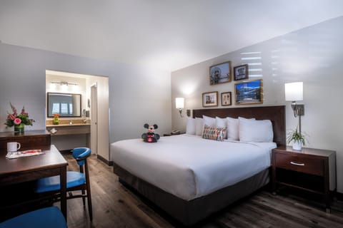 Desk, laptop workspace, iron/ironing board, cribs/infant beds