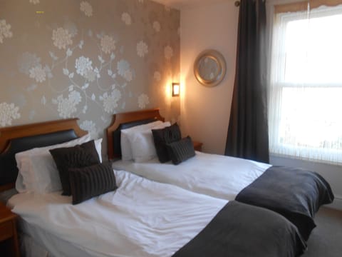 Double or Twin Room | Iron/ironing board, free cribs/infant beds, free WiFi, bed sheets