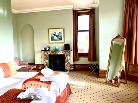 Deluxe Double or Twin Room, 1 Bedroom, Partial Sea View | In-room safe, individually decorated, individually furnished, desk