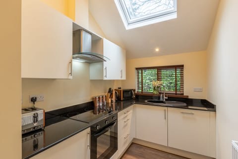 Two Bedroom First Floor Apartment on Two Levels (DUPLEX) | Private kitchen | Coffee/tea maker, electric kettle