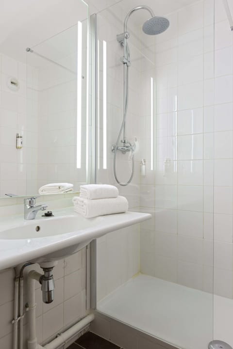 Shower, eco-friendly toiletries, hair dryer, towels