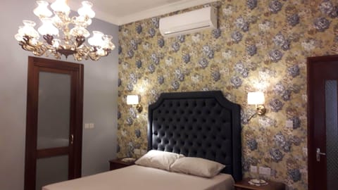 Deluxe Double or Twin Room | Minibar, blackout drapes, iron/ironing board, free WiFi
