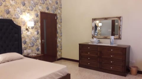 Deluxe Double or Twin Room | Minibar, blackout drapes, iron/ironing board, free WiFi