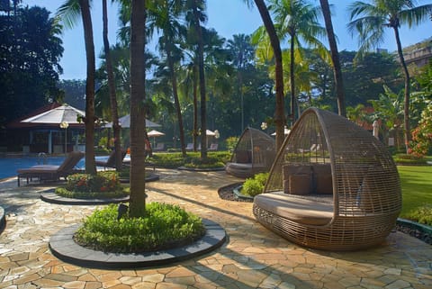 Outdoor pool, open 6:00 AM to 8:00 PM, free cabanas, pool umbrellas