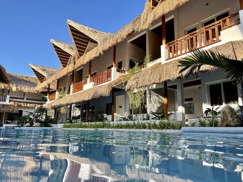 Outdoor pool, open 7:00 AM to 9:00 PM, pool umbrellas, sun loungers