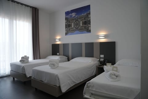 Triple Room | Premium bedding, down comforters, minibar, in-room safe