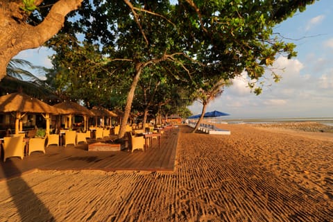 On the beach, sun loungers, beach umbrellas