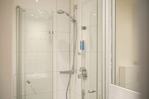 Shower, free toiletries, hair dryer, towels