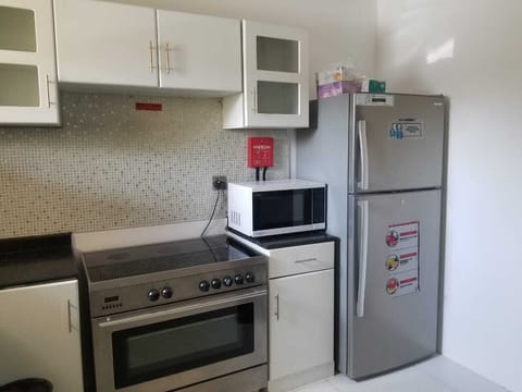 Luxury Villa, Multiple Bedrooms, Accessible, Pool View | Private kitchen | Full-size fridge, microwave, oven, coffee/tea maker