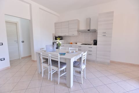 Apartment | Private kitchen | Full-size fridge, microwave, oven, espresso maker