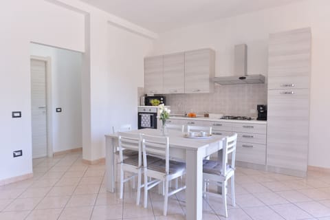 Apartment | Private kitchen | Full-size fridge, microwave, oven, espresso maker