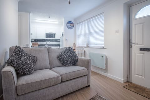 Apartment (1 Bedroom) | Living area | 32-inch Smart TV with cable channels, TV