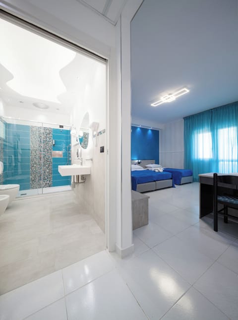 Junior Studio Suite, Sea View | Minibar, desk, laptop workspace, cribs/infant beds