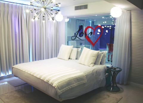 Hypo-allergenic bedding, desk, blackout drapes, iron/ironing board