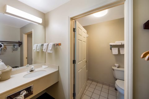 Combined shower/tub, hair dryer, towels, soap