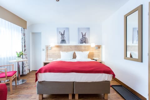 Desk, blackout drapes, iron/ironing board, cribs/infant beds