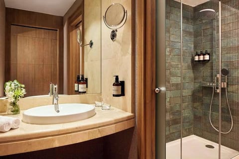 Bathtub, eco-friendly toiletries, hair dryer, bidet