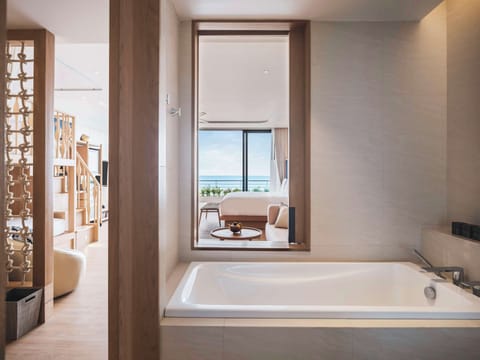 Premium bedding, down comforters, minibar, in-room safe