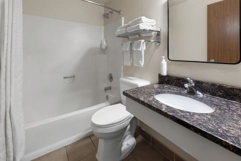 Room, 2 Queen Beds, Smoking | Bathroom | Combined shower/tub, free toiletries, hair dryer, towels