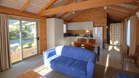 Waterfront Cabin 5 Share | Living area | Flat-screen TV