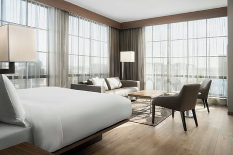 Room, 1 King Bed with Sofa bed, Corner | In-room safe, desk, laptop workspace, blackout drapes