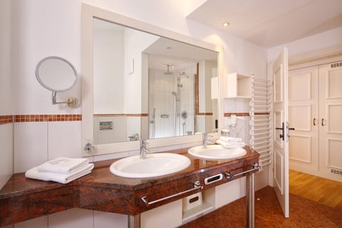 Hair dryer, heated floors, towels, soap