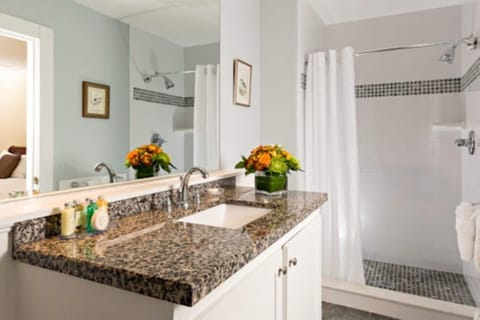 Classic King | Bathroom | Shower, designer toiletries, hair dryer, bathrobes
