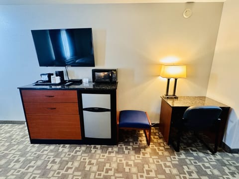 Desk, blackout drapes, iron/ironing board, free cribs/infant beds