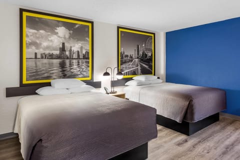 Room, 2 Queen Beds, Non Smoking | Desk, iron/ironing board, free cribs/infant beds, free WiFi