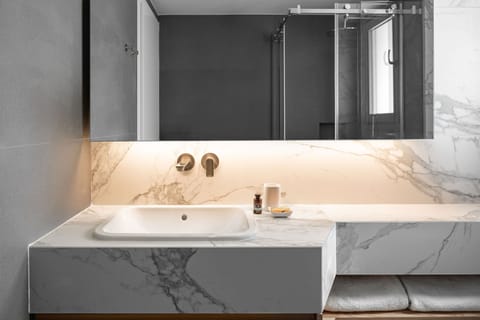 One Bedroom Apartment T | Bathroom | Shower, rainfall showerhead, designer toiletries, hair dryer