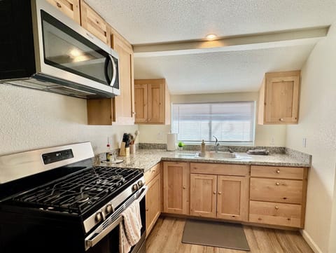 Deluxe Apartment, 3 Bedrooms | Private kitchen | Coffee/tea maker