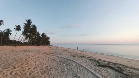 On the beach, white sand