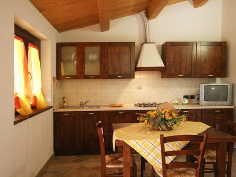 Villa | Private kitchen | Electric kettle, highchair