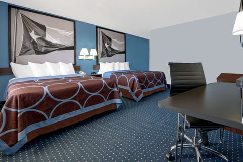 Desk, blackout drapes, iron/ironing board, rollaway beds