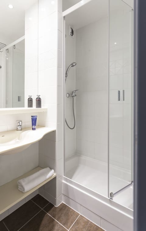 Shower, free toiletries, hair dryer, towels