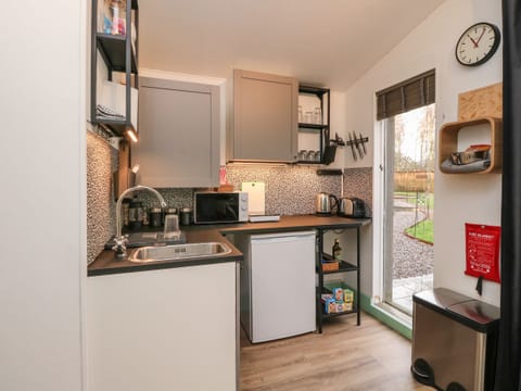 Fridge, electric kettle, toaster, cookware/dishes/utensils