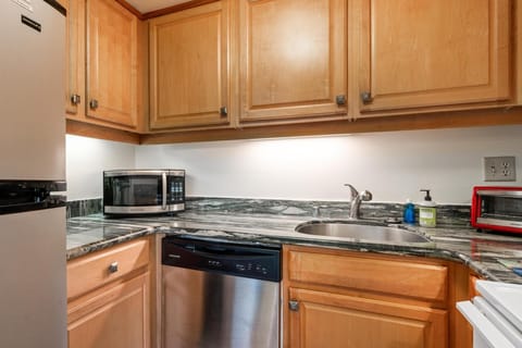Condo, 1 Bedroom | Private kitchen | Fridge, oven, dishwasher, coffee/tea maker