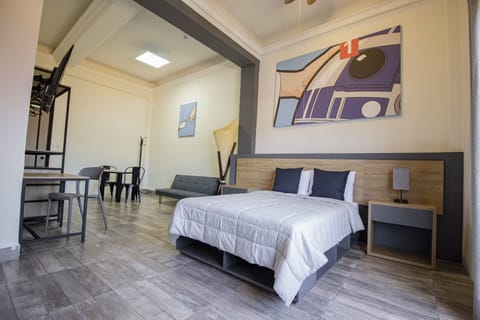 Basic Quadruple Room, 2 Queen Beds | Down comforters, desk, laptop workspace, free WiFi