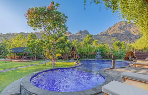 Outdoor pool, open 6:30 AM to 7:00 PM, free cabanas, pool umbrellas